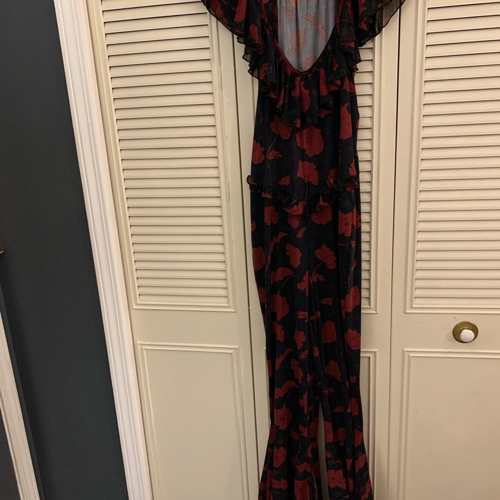 Free People Austyn one piece floral, ruffle, bell bottom jumpsuit. - Picture 4 of 5